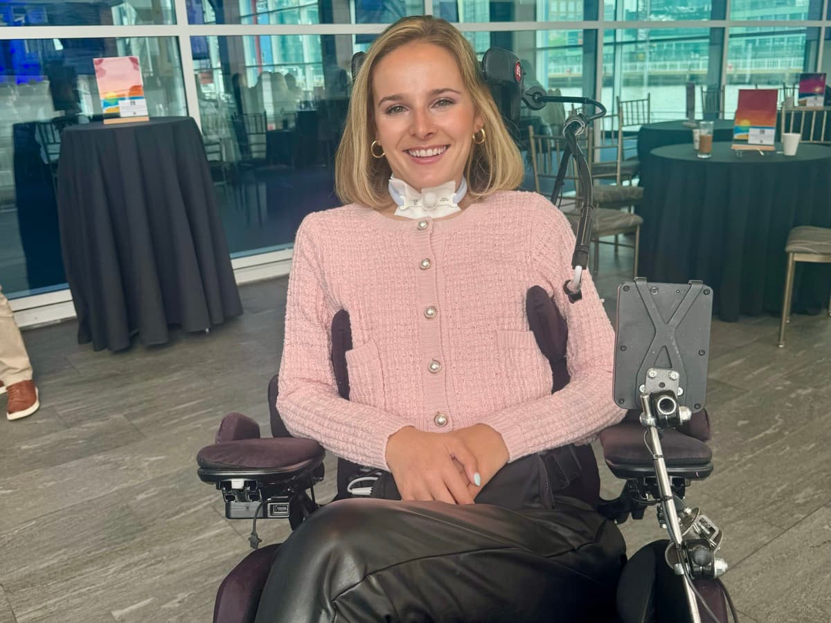 Rebecca in a pink sweater at the Every Moment Matters conference at Pier 60, New York City.